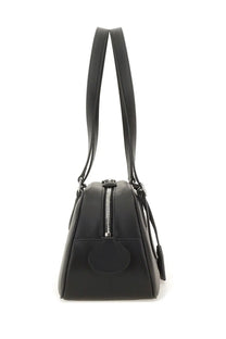 Courrèges women’s bowling bag friday medium black in black leather with sleek minimalist design and silver zipper accents