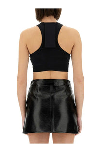 Courrèges women’s black patent leather mini skirt with central front seam and two side pockets