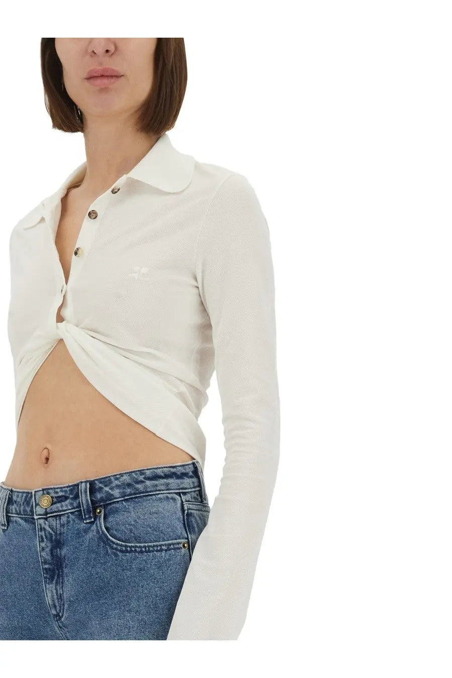 Courrèges women’s white long-sleeved cropped polo shirt with twisted front detail and subtle embroidered logo