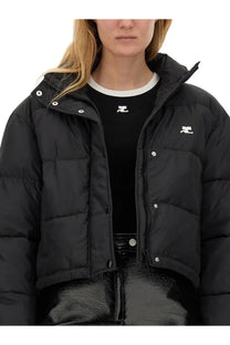 Courrèges women’s black down jacket with quilted design and white logo patches on chest and hood