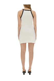 Courrèges women’s sleek white halter-neck mini dress with black trim along neckline and straps