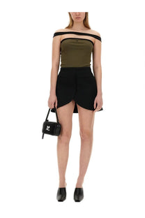 Black mini handbag with distinctive white Courrèges logo on front complementing the women’s Ellipse mini skirt black