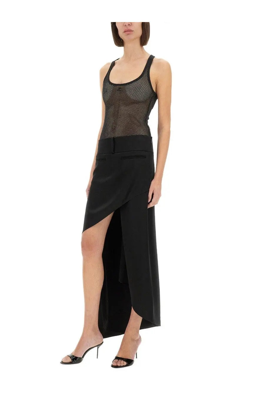 Black mesh tank top paired with courrèges women’s infinity heritage black high-waisted asymmetrical skirt