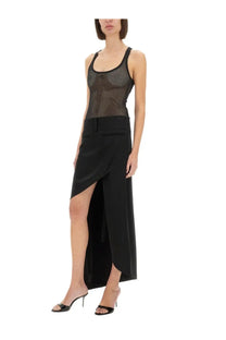Black mesh tank top paired with courrèges women’s infinity heritage black high-waisted asymmetrical skirt