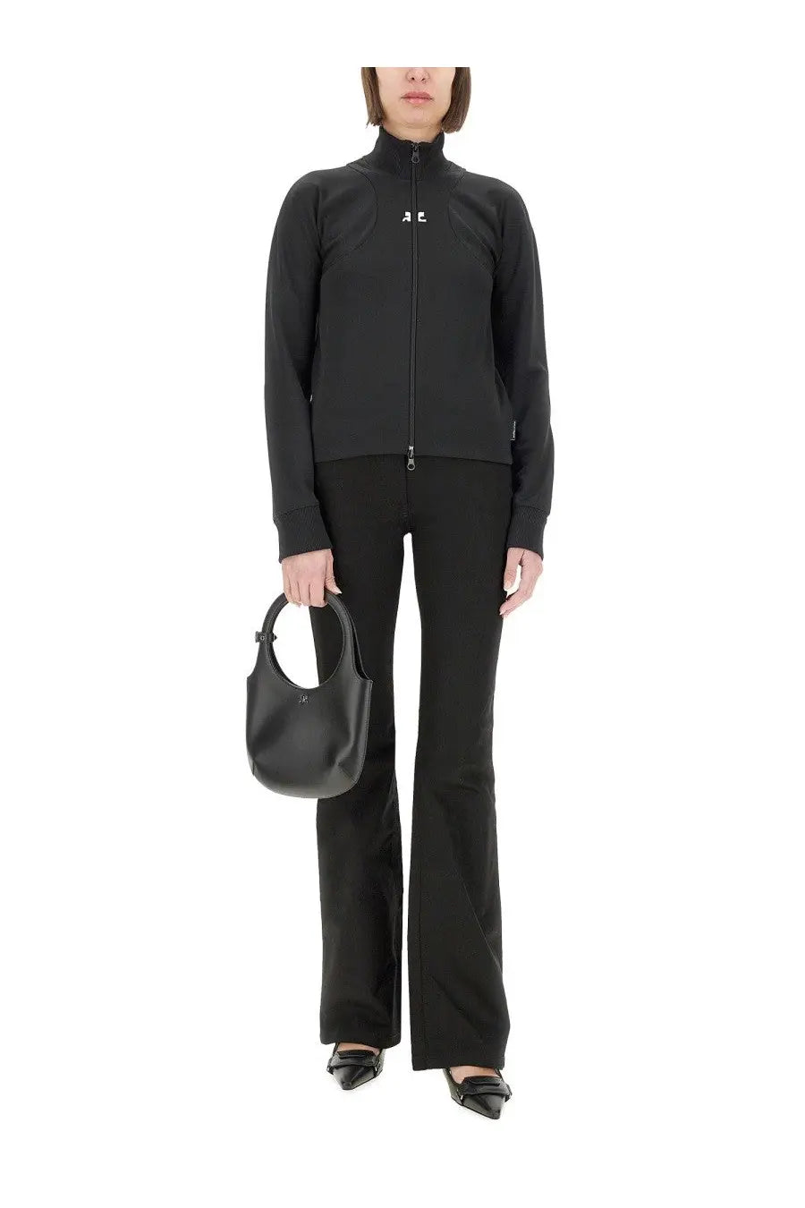 Black leather handbag with circular top handle and minimalist logo detail by courrèges womens interlock scuba jacket black