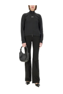 Black leather handbag with circular top handle and minimalist logo detail by courrèges womens interlock scuba jacket black
