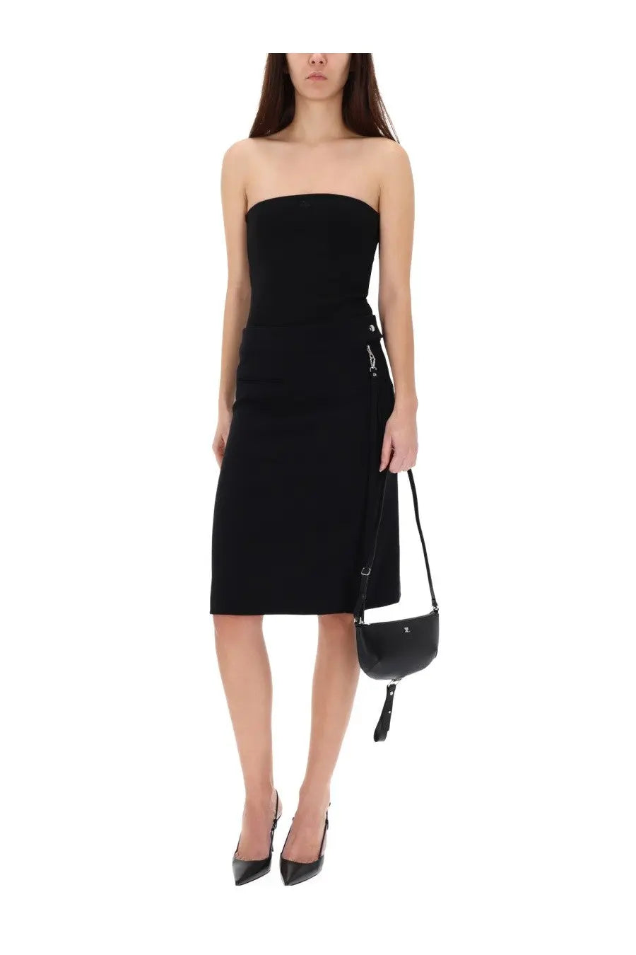 Black leather mini crossbody bag with tassel detail paired with courrèges women’s midi skirt black