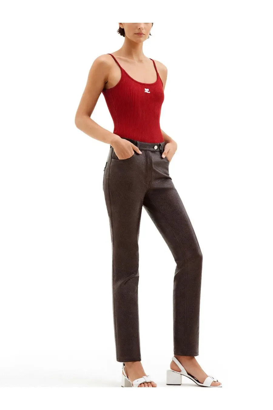 Dark brown faux leather high waisted straight leg pants with sleek modern cut and visible stitching details
