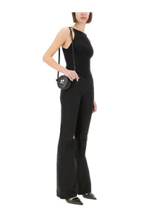 Black circular crossbody bag with minimalist logo detail paired with courrèges women’s ribbed black tank top