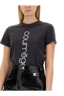Black courrèges women’s short-sleeved shirt with vertical white courrèges lettering across the chest