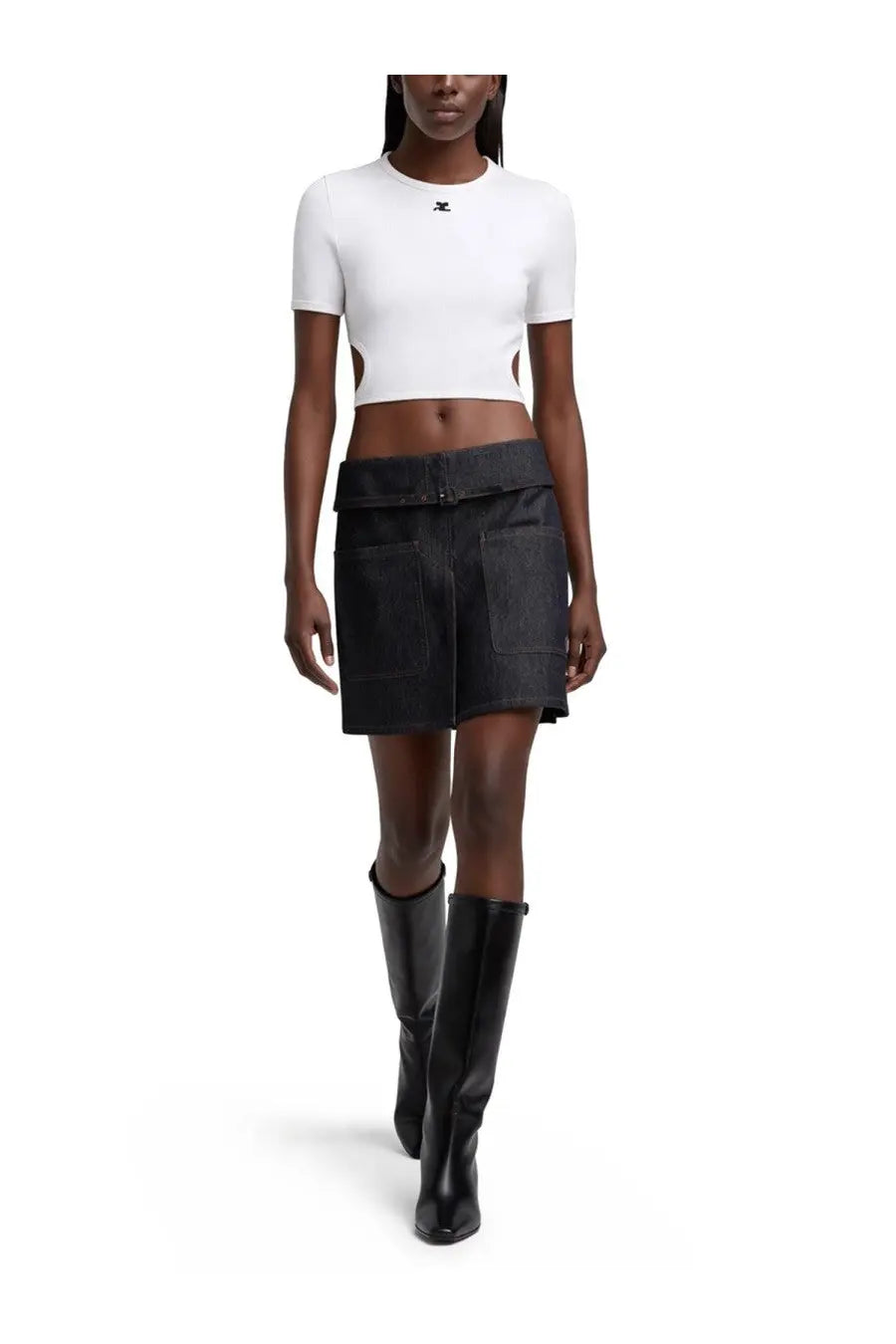 Black utility mini skirt with wide belt and front pockets styled with courrèges women’s shirt cut out con white