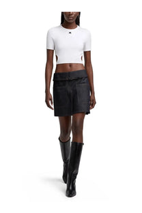 Black utility mini skirt with wide belt and front pockets styled with courrèges women’s shirt cut out con white