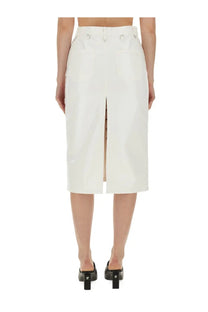 White high-waisted midi skirt by courrèges with a central front slit and structured clean lines