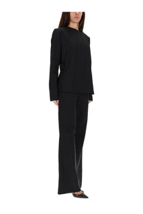 Black pinstripe tailored suit with structured blazer and wide-leg trousers featuring courrèges women’s tailored pants black