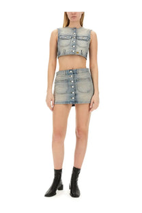 Courrèges women’s cropped light-wash denim top with button front and chest pockets paired with matching mini skirt