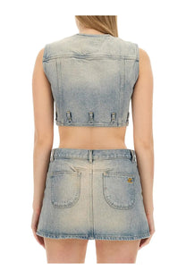 Back side of courrèges women’s light-wash denim sleeveless cropped vest with three adjustable metal tabs