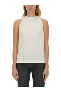 Courrèges women’s white halter-neck top made of lightweight flowing fabric with a subtle draped neckline and clean seams