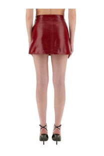 A glossy crimson vinyl mini skirt with high waist and front seam from courrèges womens reedition red collection