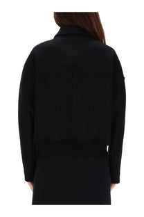 Courrèges women’s black wool-blend bomber jacket with structured collar and ribbed hem front view