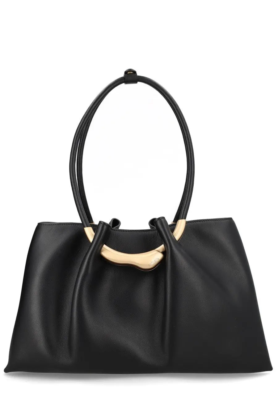 Cult gaia women’s black leather tote bag with gold tone circular handles and curved metal accent at the top