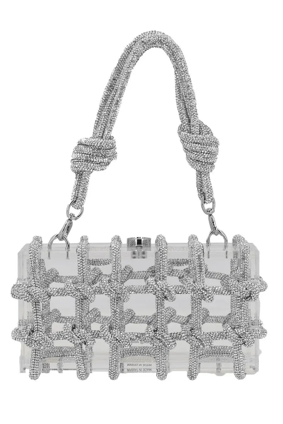 Clear acrylic clutch bag with silver crystal embellished knotted handles and intricate silver knot patterns by cult gaia