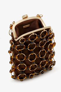 Cult Gaia women’s brielle wristlet leather handbag beige with brown tortoiseshell clutch and gold chain-link frame