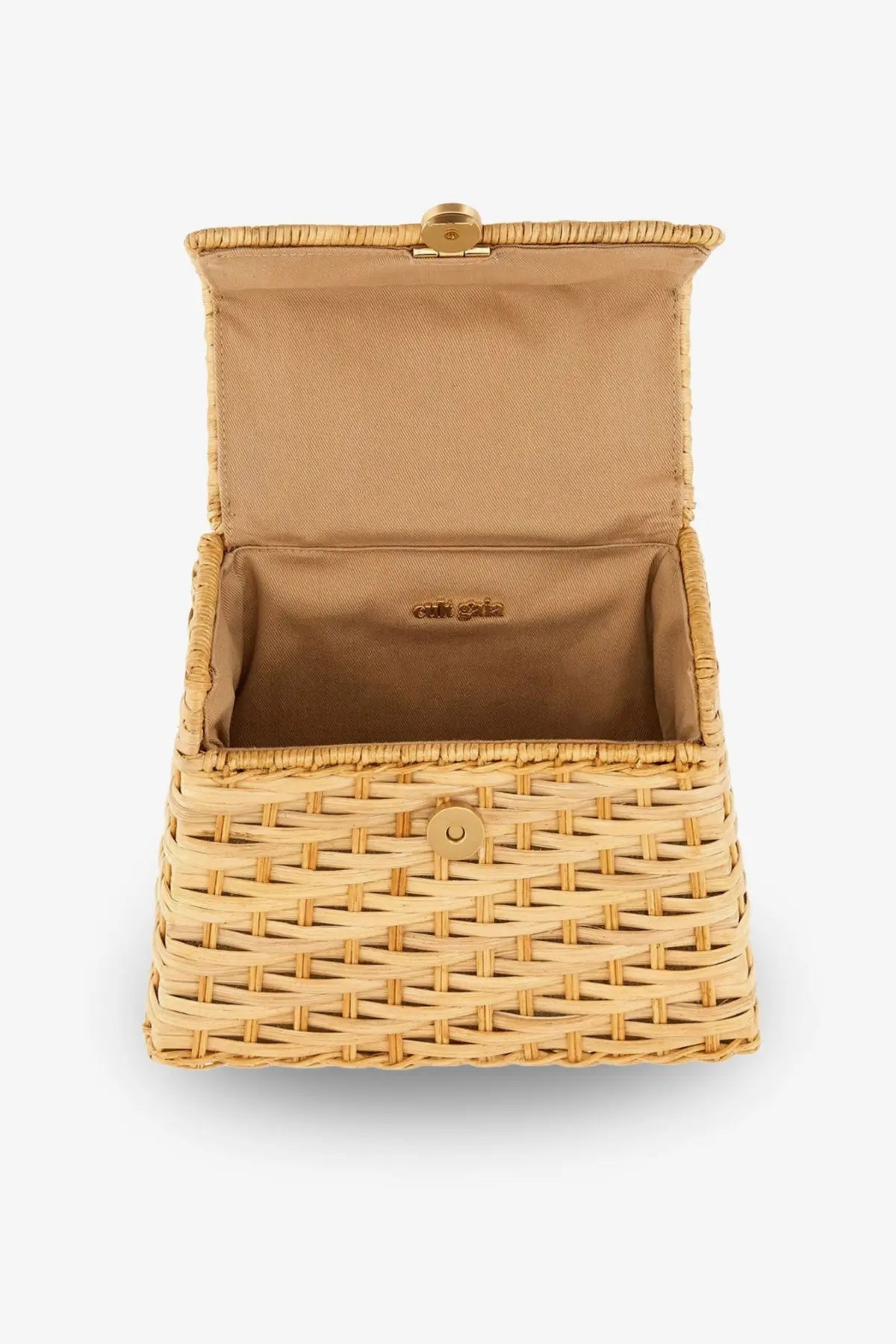 A light beige woven wicker clutch with gold-tone clasp and button closure from Cult Gaia women’s Sybil handbag collection