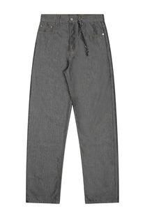 Dark gray denim jeans with subtle textured weave and decorative beaded chain on front button by darkpark women