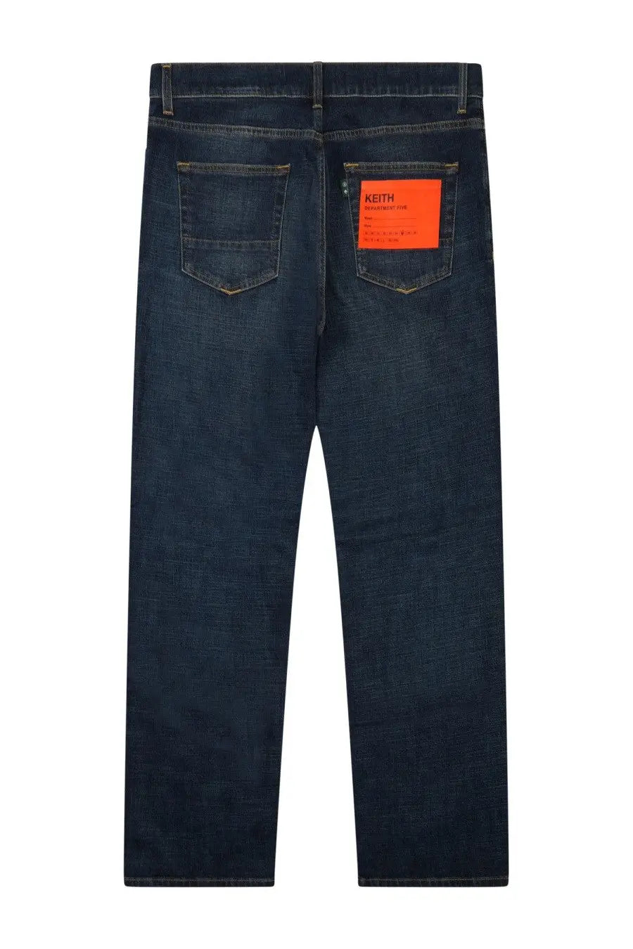 Back side of department five men’s dark blue denim jeans with a bold orange label on the right back pocket