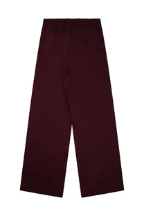 Back view of department five women’s red maroon wide-leg sweatpants with elastic waistband and black logo on pocket