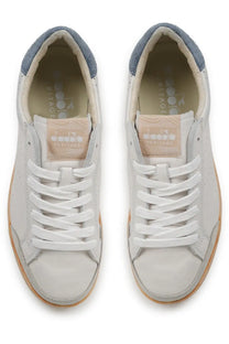 Diadora men’s sneaker prestige plain used white leather sneakers with light blue suede accents and tan rubber soles