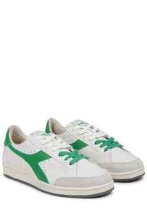 Diadora men’s sneaker prestige used white low-top with white and green suede accents on toe cap and heel