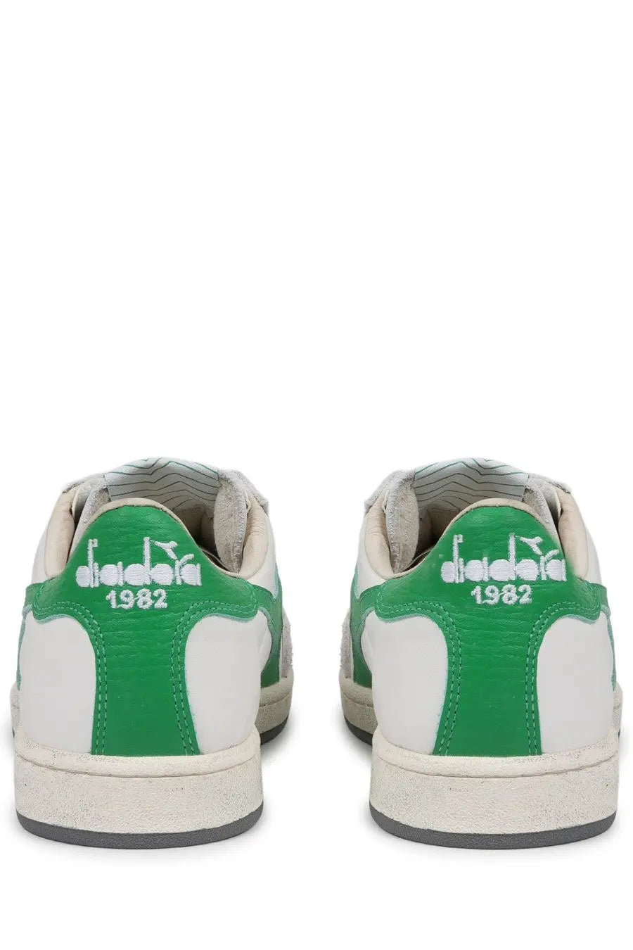 Back view of diadora men’s sneaker prestige used white in white and green with retro design and 1982 embroidered heel