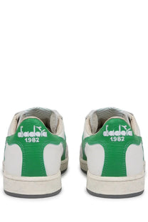 Back view of diadora men’s sneaker prestige used white in white and green with retro design and 1982 embroidered heel