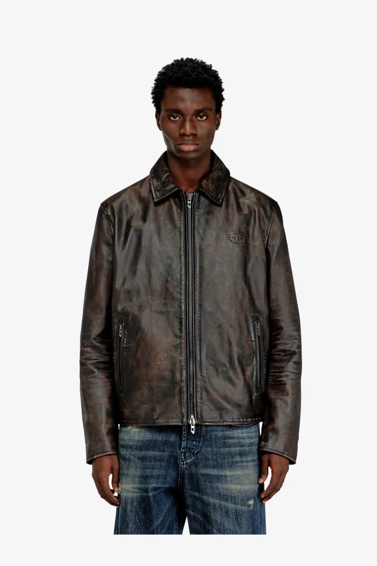 Dark brown distressed leather jacket with subtle embossed logo on left chest from Diesel men’s Amar Wrd collection