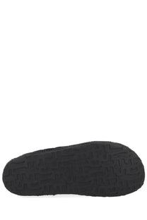 Black rubber sole with repeating geometric tread pattern on diesel men’s boot lukas akb black