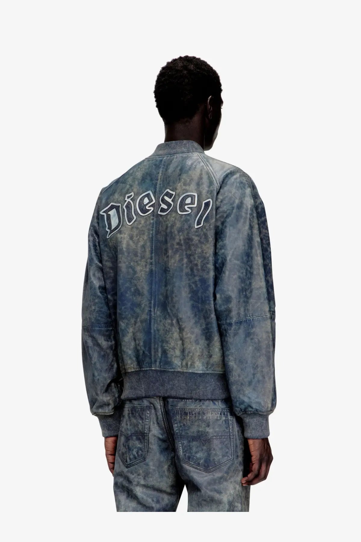 Back view of diesel men’s cobb leather jacket grey in blue denim with faded wash and white diesel embroidery