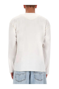 Diesel men’s white cotton long-sleeved shirt with a simple clean design and subtle fabric texture