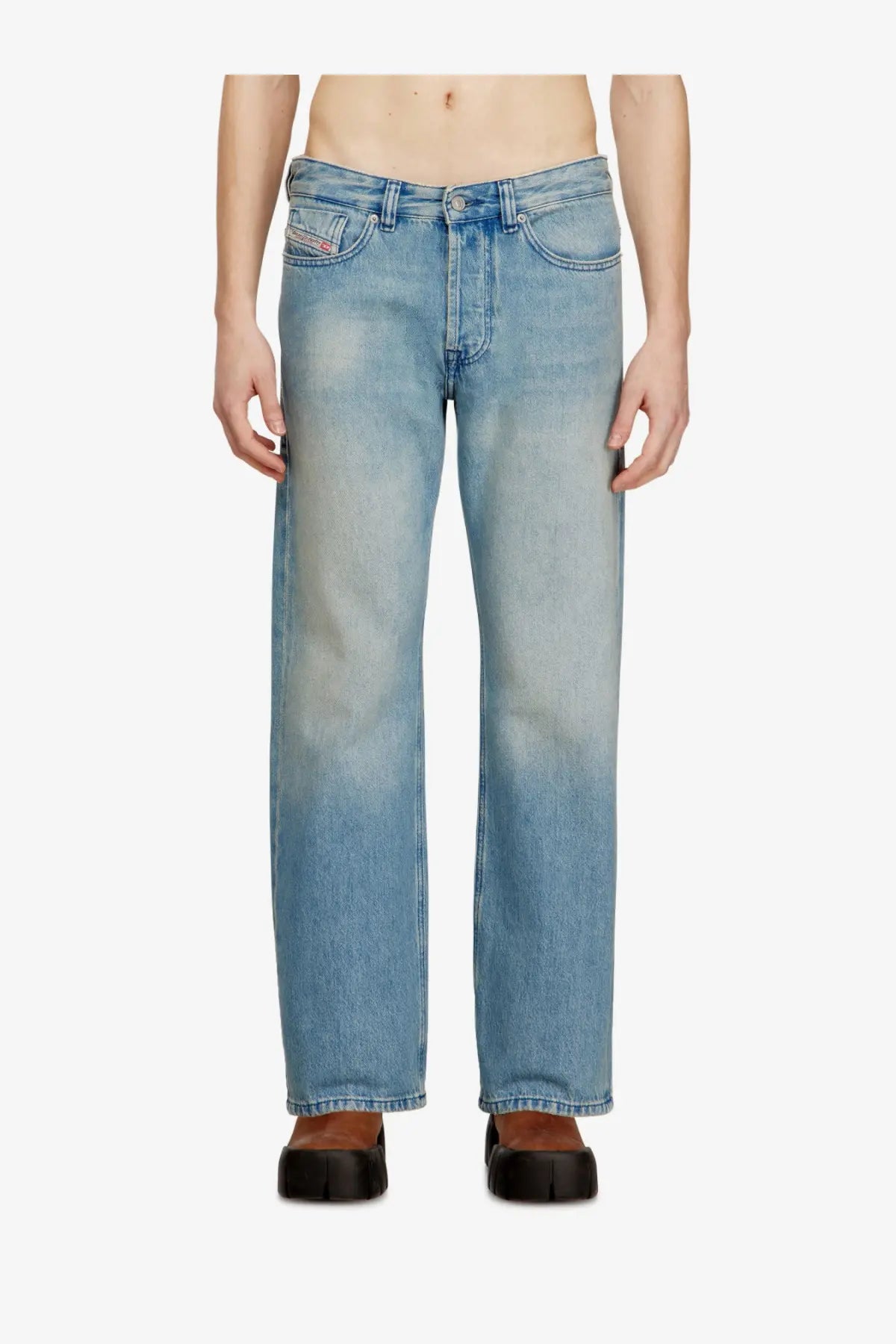 Back side of diesel men’s Eeper blue light-wash denim jeans with straight-leg cut and subtle fading showing brand logo
