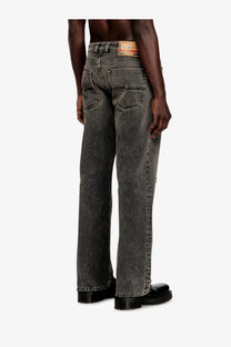 Dark gray faded denim jeans with relaxed fit and classic back pockets shown from the back by diesel men’s eeper ra