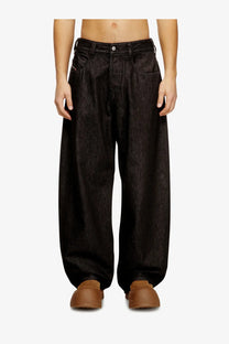 Diesel men’s black denim trousers with wide-leg fit, faded textured finish, and classic five-pocket design