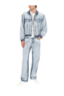 Diesel men’s Giacca Denver FSI1 blue light-wash denim jacket with button-up front and chest pockets paired with jeans