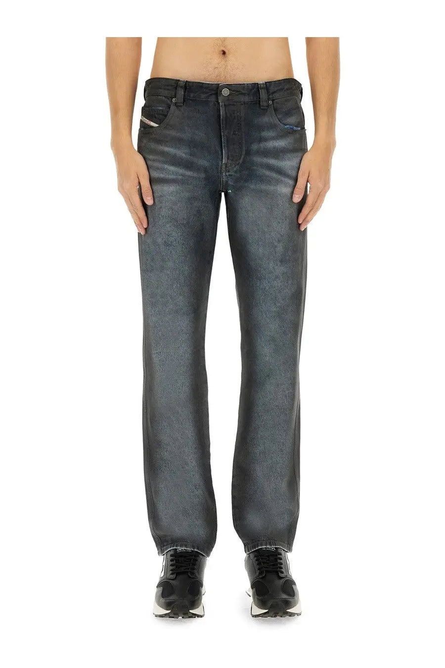 Diesel men’s dark-wash denim jeans in blue with a faded distressed look and subtle textured finish
