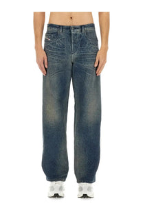 Diesel men’s blue dark-wash denim jeans with a wide-leg cut and subtle distressed texture front view