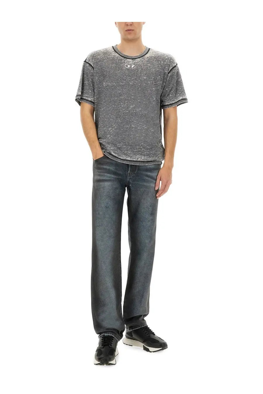 Diesel men’s jeans blue with a gray textured short-sleeve t-shirt featuring a subtle white logo on the chest