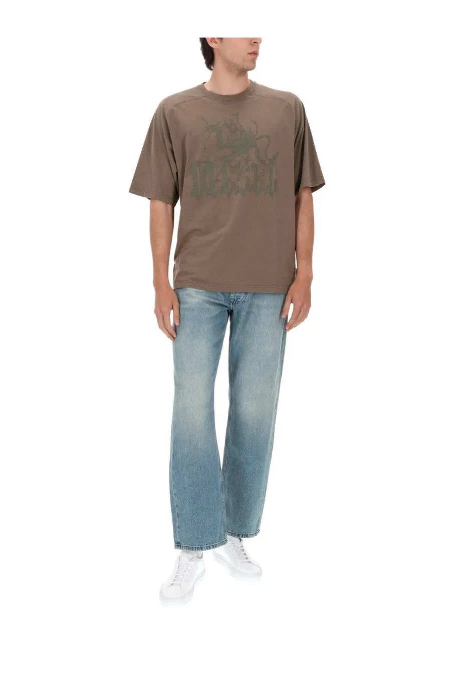 Brown short-sleeved t-shirt with faded green graphic print paired with diesel men’s jeans eeper blue