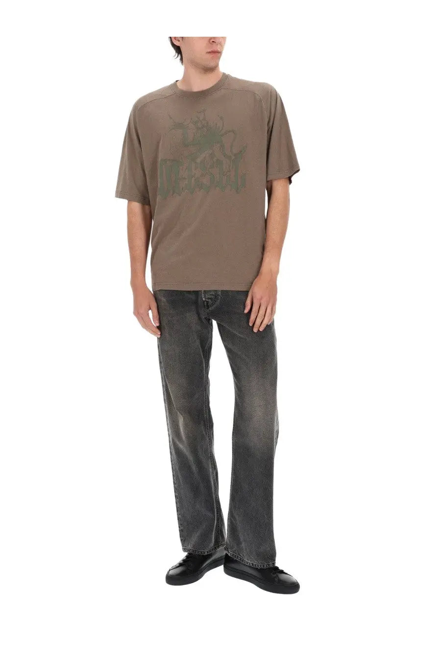 Olive green short-sleeved t-shirt with faded dark green graphic print paired with diesel men’s jeans eeper grey