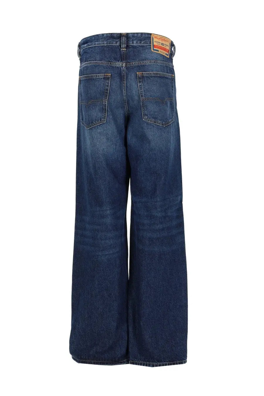 Dark blue denim Diesel men’s jeans back side with classic pocket design and visible brand label at waistband