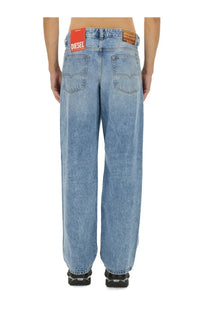 Back view of light-wash blue denim diesel men’s jeans with relaxed wide-leg cut and red diesel branding on waistband