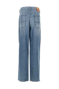 Back view of diesel men’s jeans macro blue light-wash denim with straight-leg cut and brown leather brand patch